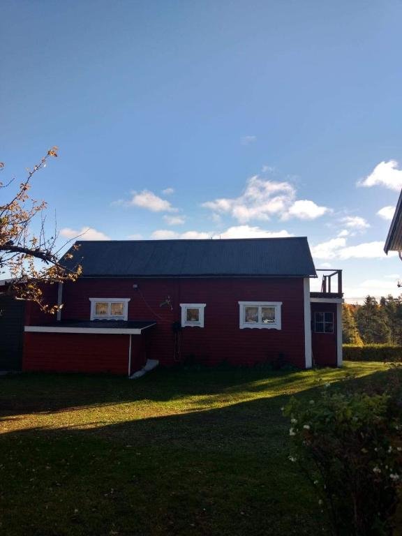 Red wooden building of Lillstugan in Älvkarleby